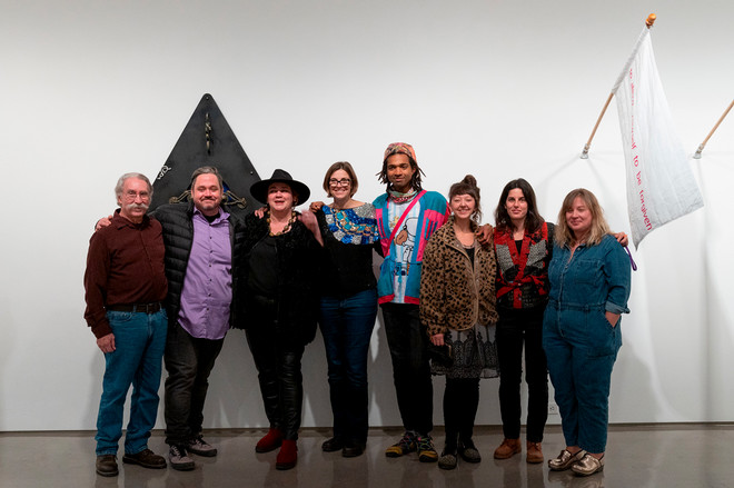 Artists posing together