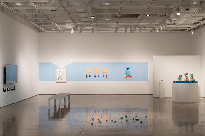 empty gallery space filled with artwork