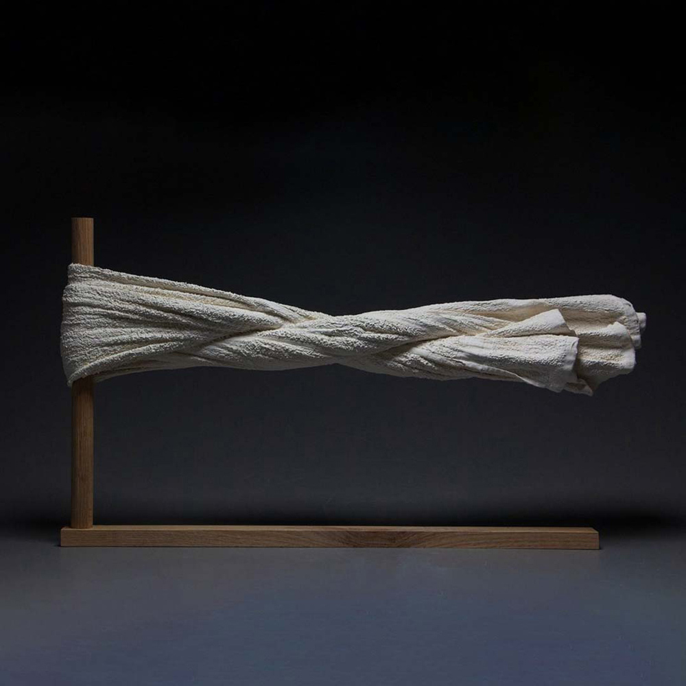 porcelain sculpture of cloth blowing in the wind weightless