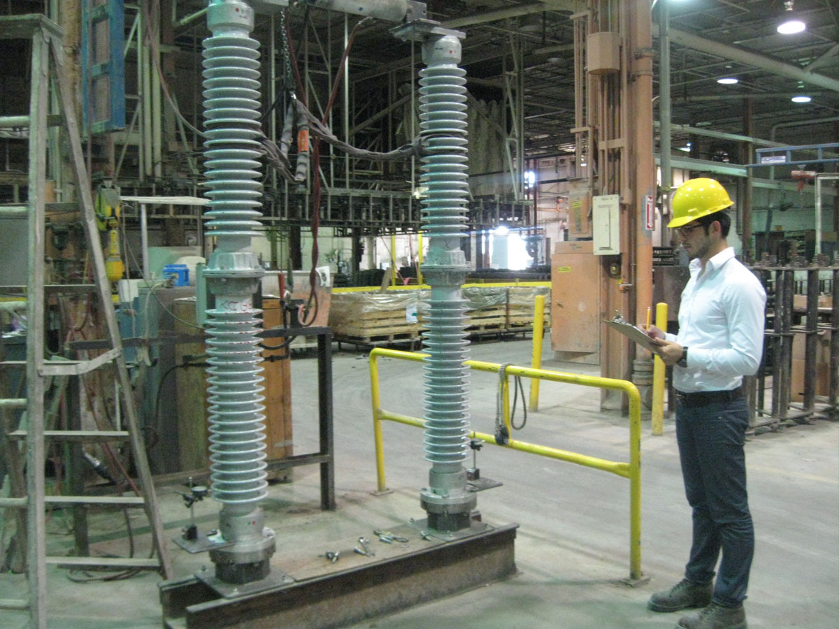 Intern working on electrical capacitors