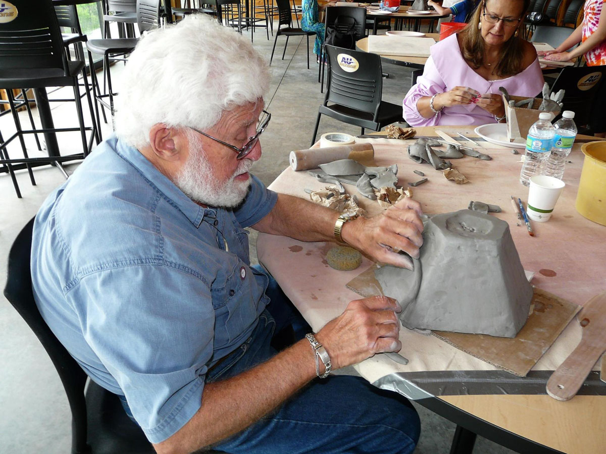 Adult male student at clay workshop
