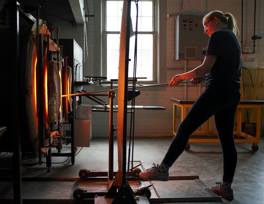 student in the hot job working at the glory hole