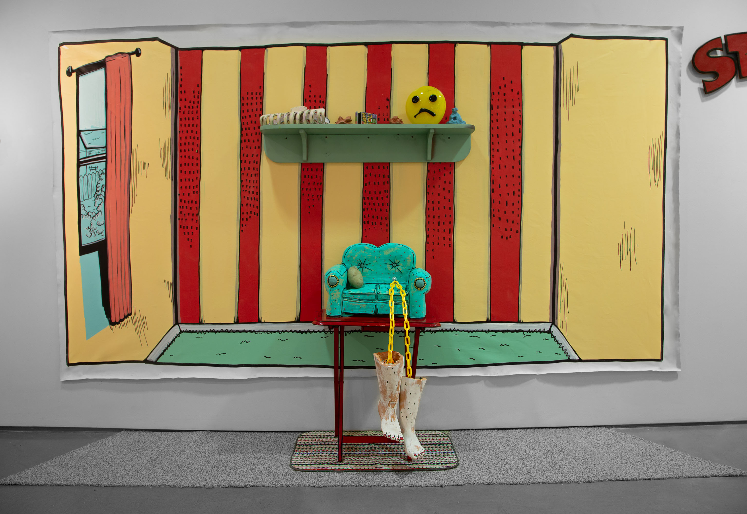 Whimsical room with striped walls, shelves, and boots hanging from chains.