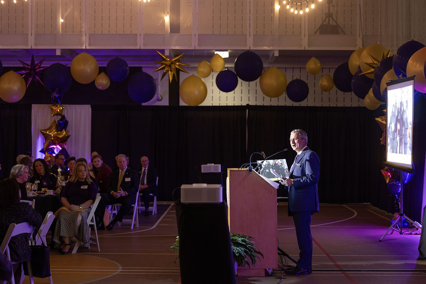 Mark Zupan at a podium speaking