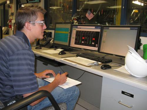 Internship student working at a computer