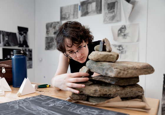 Student in class creating art