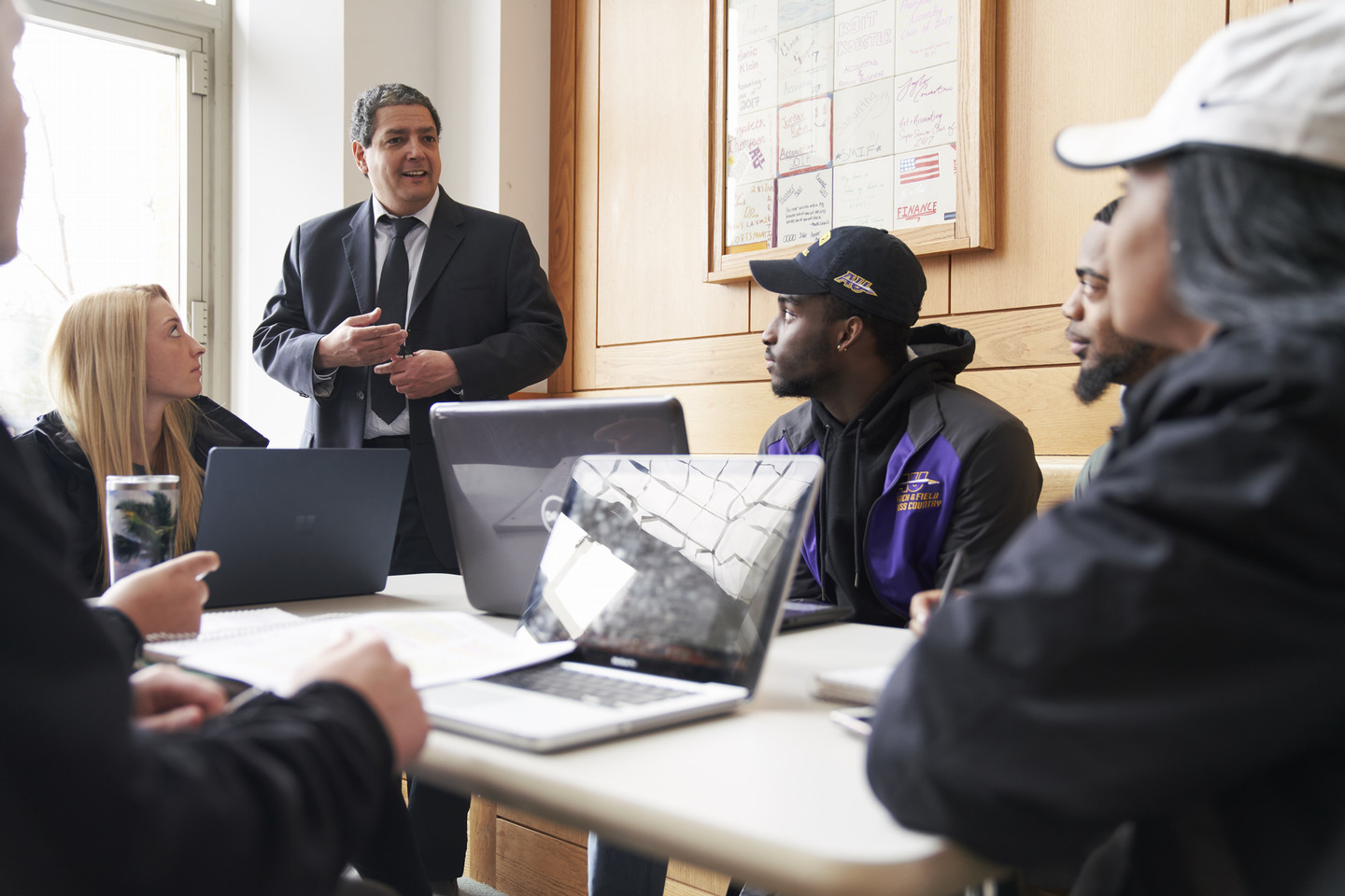 Student in a science lab with professor