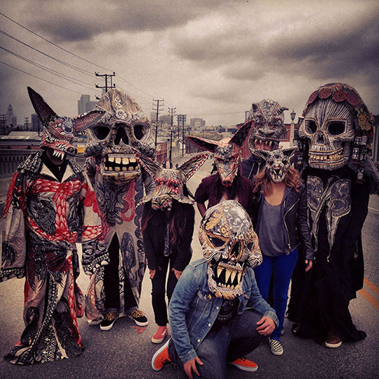 photo of people wearing weird, scary masks